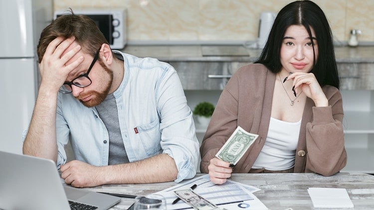 Couple looking at their finances.