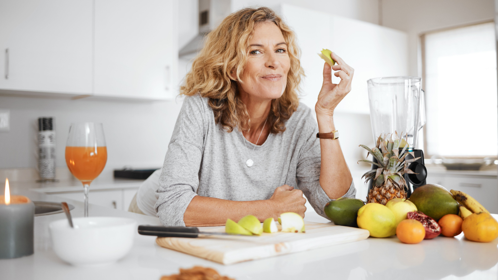 Woman Mature Food Eating Fruit Health PeopleImages.com Yuri A Shutterstock